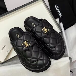 CHANEL Black Quilted Leather Slide Mules with Gold CC Logo